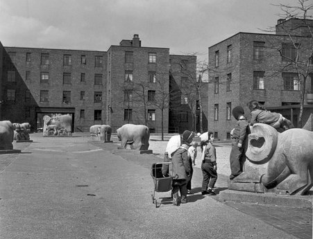 Children playing outside the Jane Addams Homes, 1324 South Loomis, Chicago, Illinois, May 16, 1951.