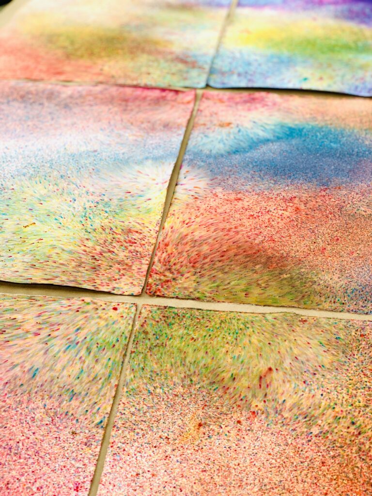 Photographs of Marisa Morán Jahn’s vibrant hand-dyed rainbow wallpaper tiles.