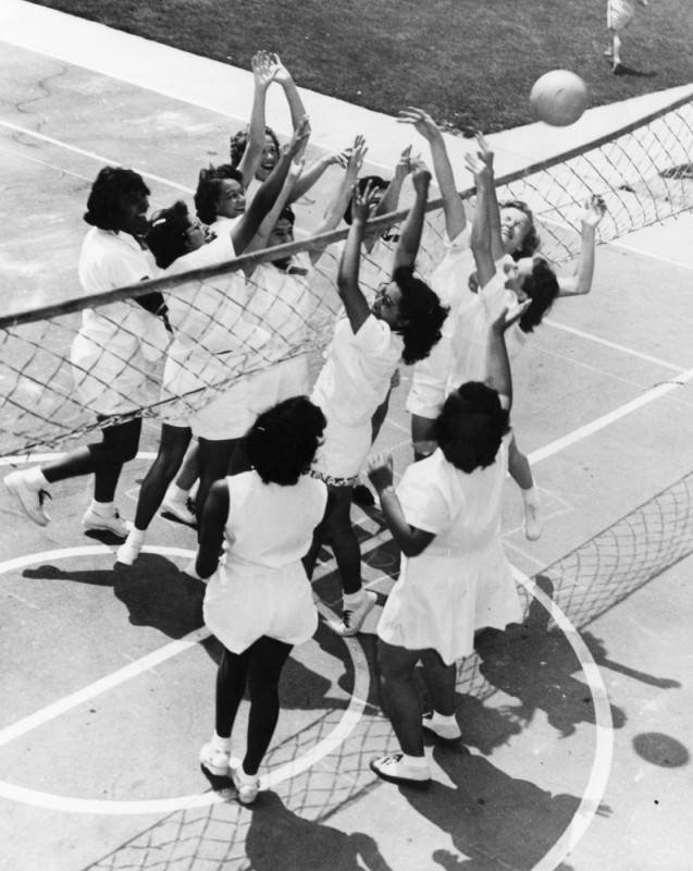 Public housing agencies supported residents, with many creating their own sports leagues. At the William Mead Homes in Los Angeles, CA, the girls’ volleyball team celebrates becoming city champions in 1951. Leonard Nadel, Housing Authority Collection/Los Angeles Public Library.