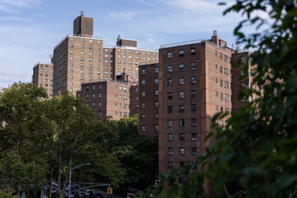 An elevated view of several brick tower buildings