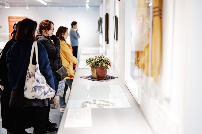 People looking at a museum exhibit