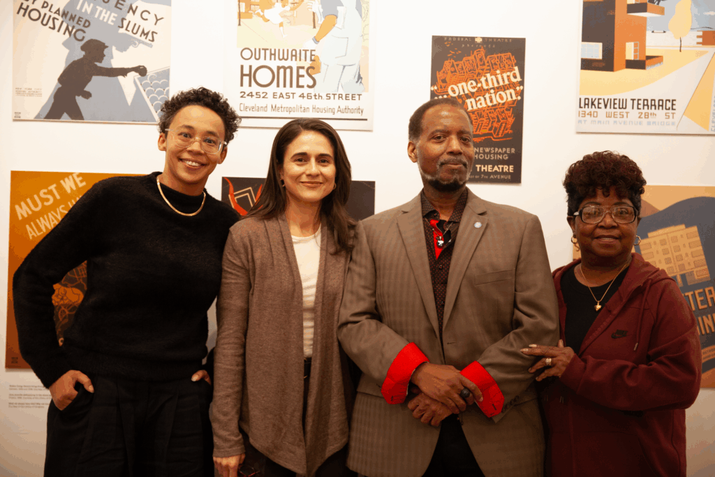 Portrait of four presenters after an event