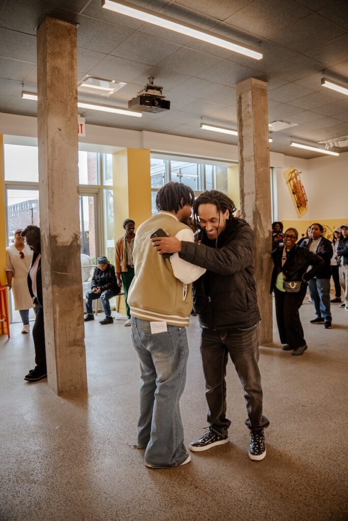 Two people dapping