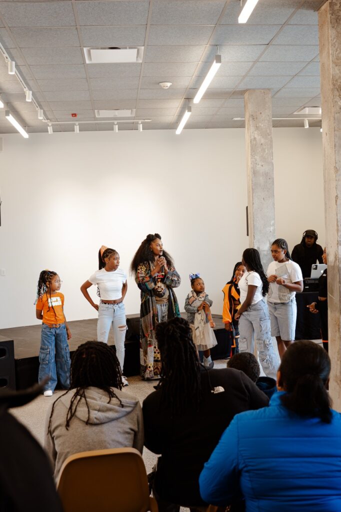 A dance demonstration from Kuumba Lynx at the National Public Housing Museum